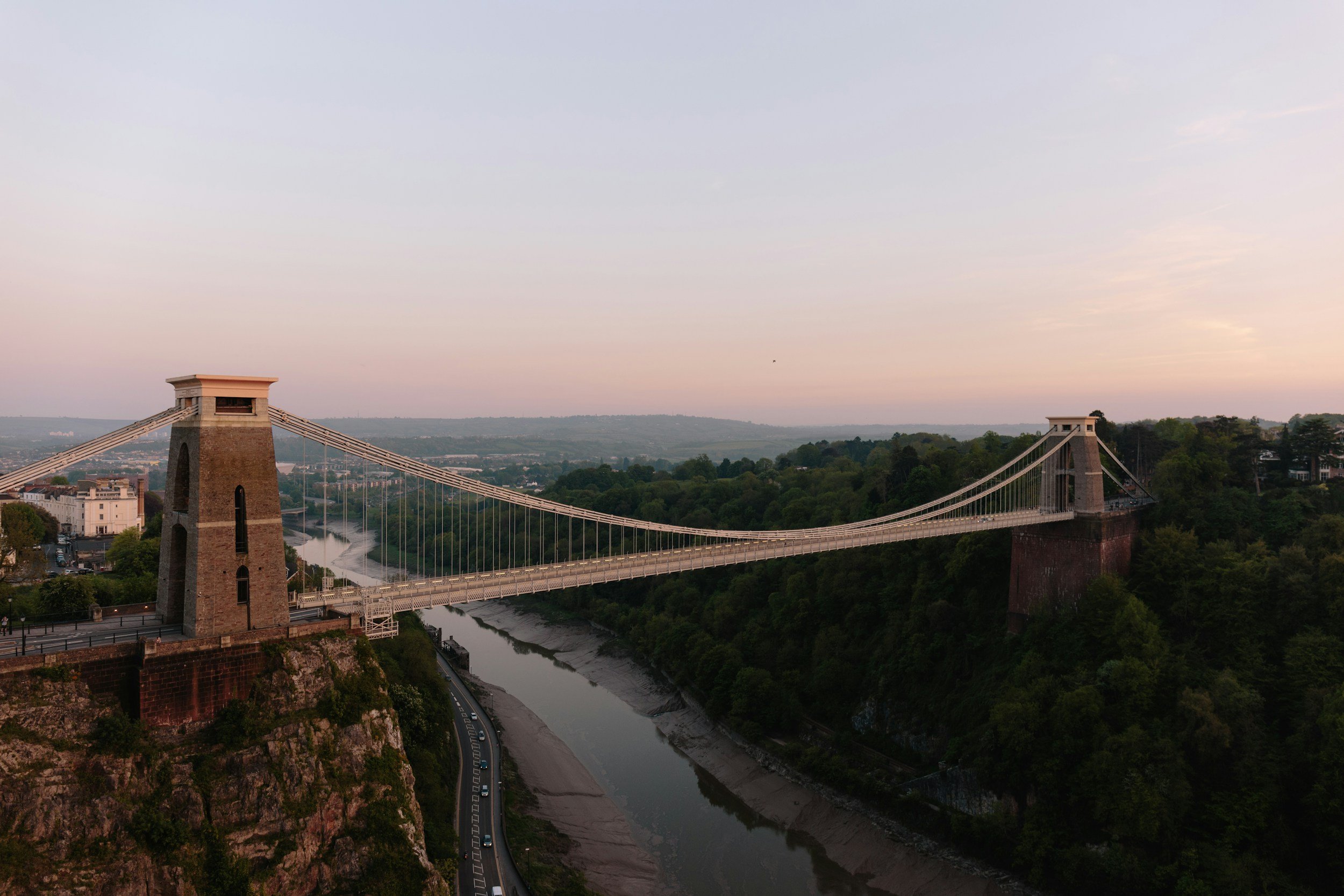 An aerial photo of Clifton Suspension Bridge in the evening.