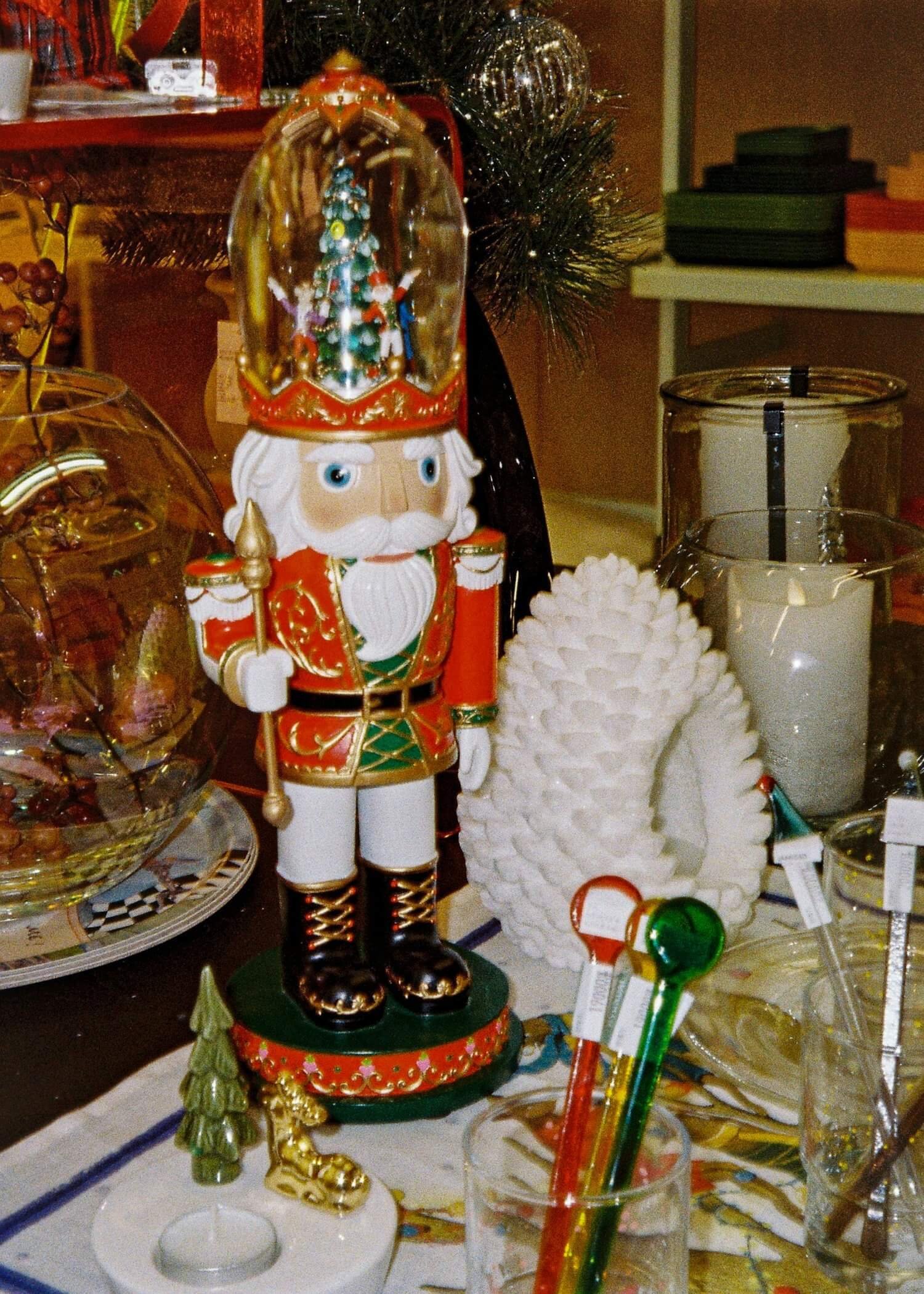 A photo of a Christmass prop surrounded by other props.