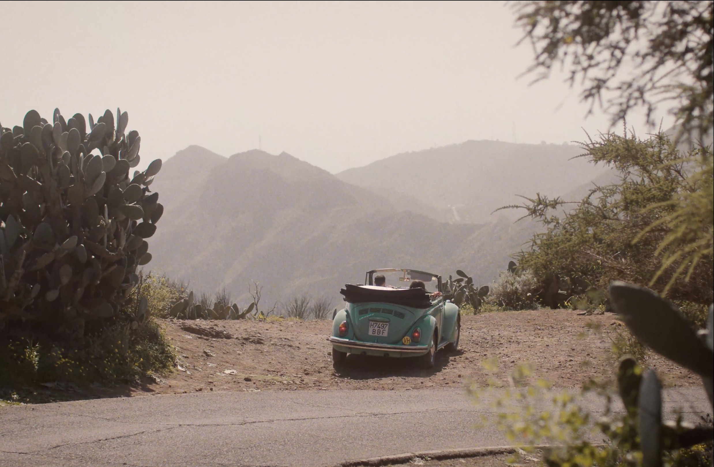 An image of a Beetle Car filled with models on the FatFace 2024 Summer shoot. 