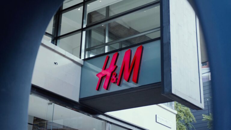 An image of H&M's storefront logo in Bristol taken during their store launch event.