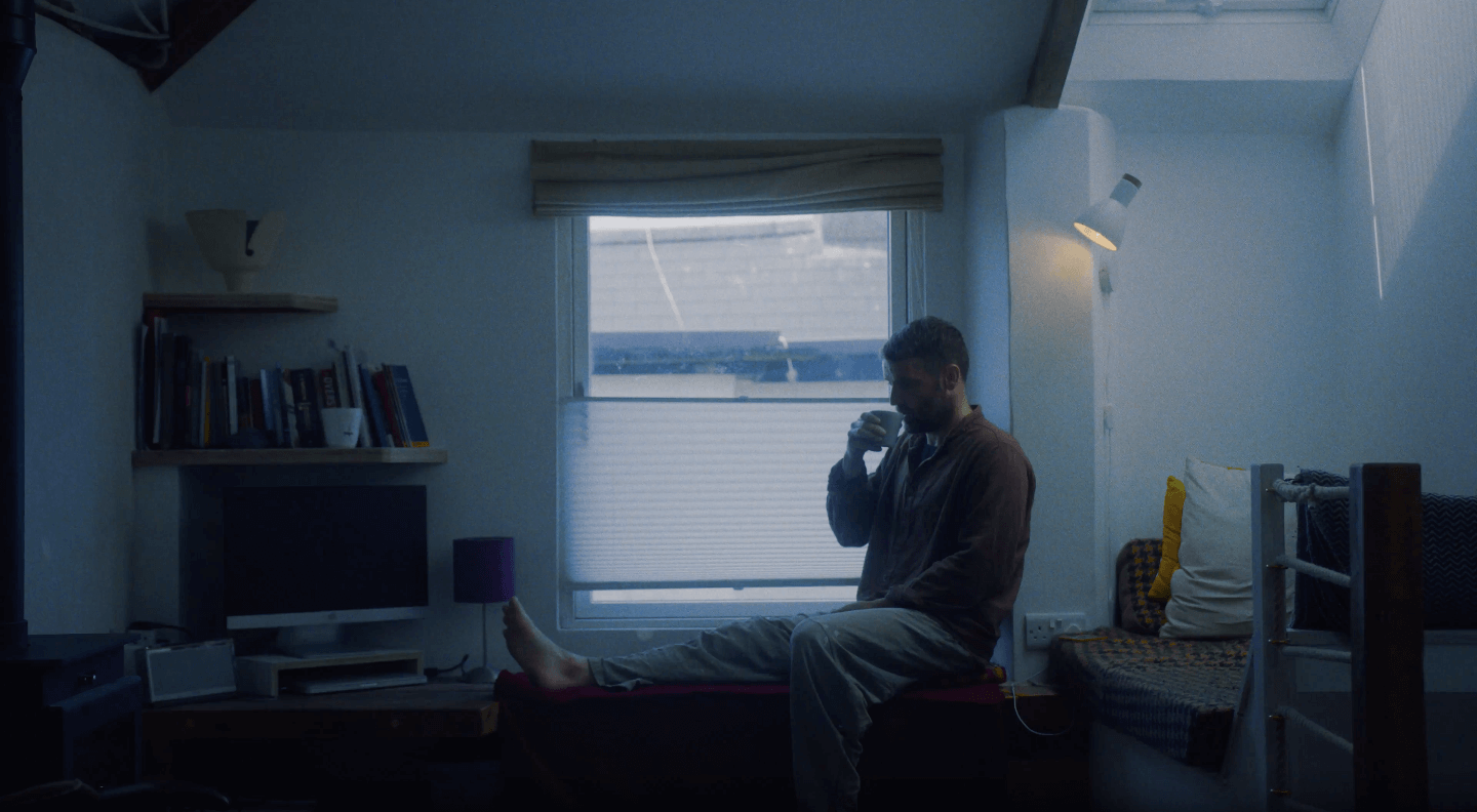 An image of Jake Boax, potter and artist, in his house in Cornwall.