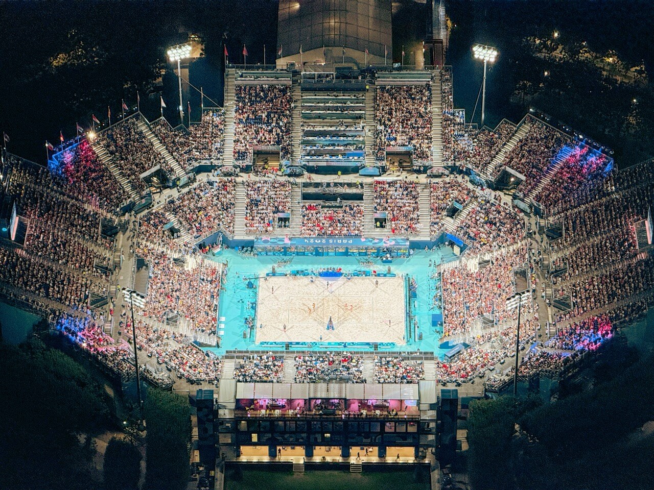 A picture of the main Olympic Stadium beneath the Eiffel Tower in Paris.