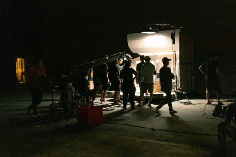 A picture of a film set with a executive producer on set.