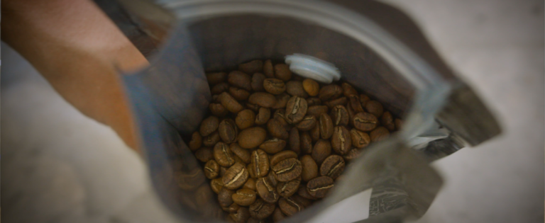 An image of a bag of roasted coffee beans.