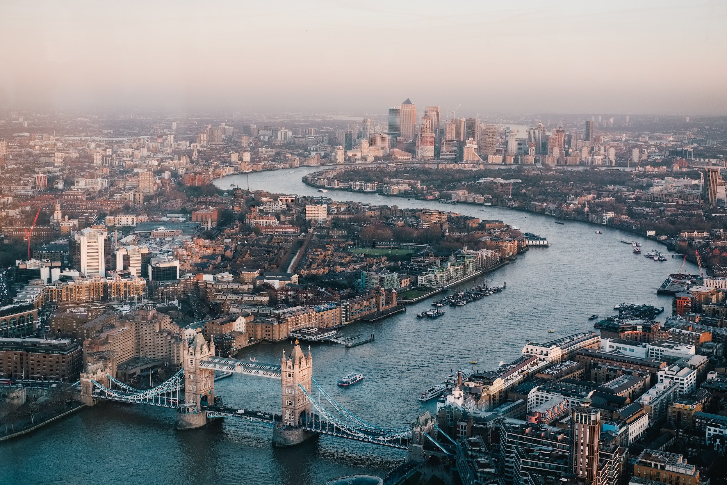 An arial shot of London looking down the Themes with London Bridge in the foreground.