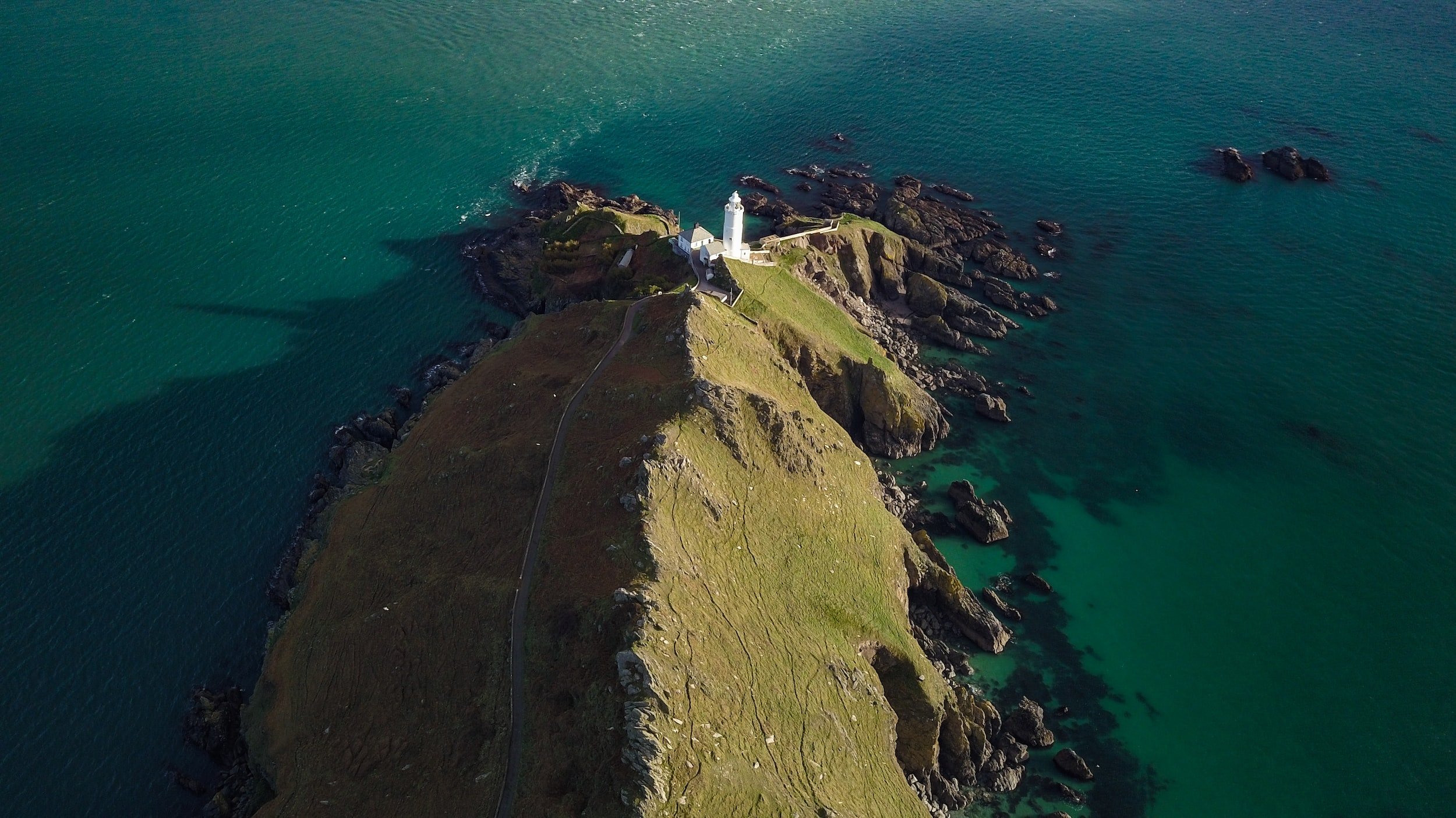 Arial shot of the coastline of Devon.