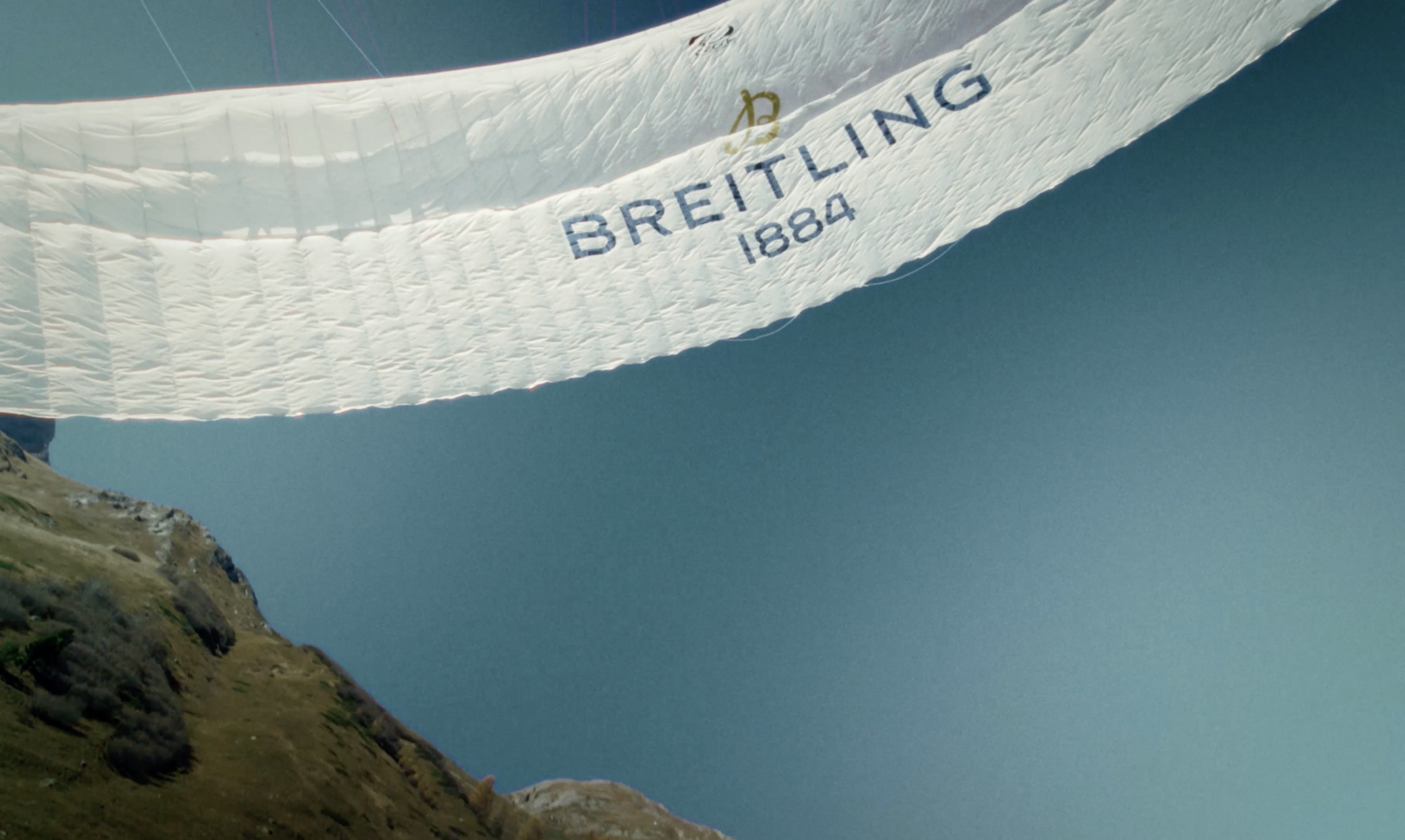 An image of the Turner Twins in the sky flying an electric Paramotor.